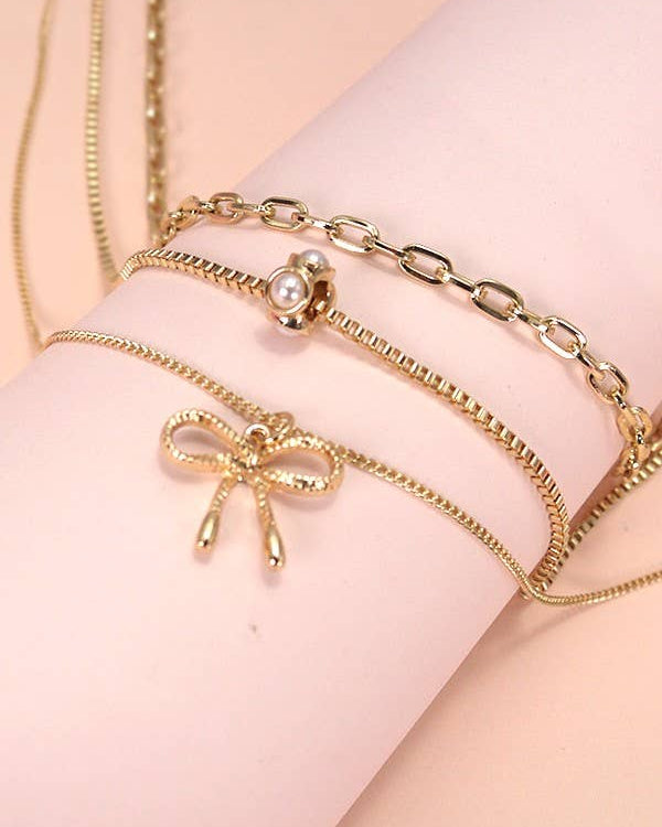 Pearl Bow Charm Necklace | 80N605 necklace JOSSLYN by wall to wall- Tilden Co.