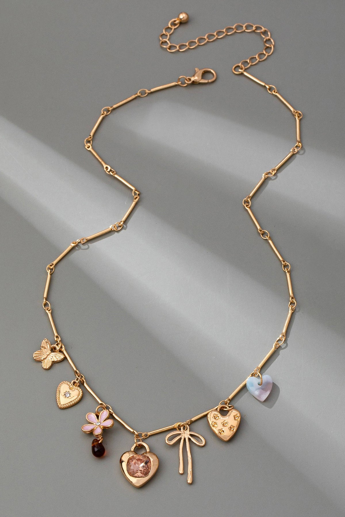 CHARM NECKLACE-HEARTS FLOWER BOW BUTTERFLY | 80N92639 JOSSLYN by wall to wall- Tilden Co.