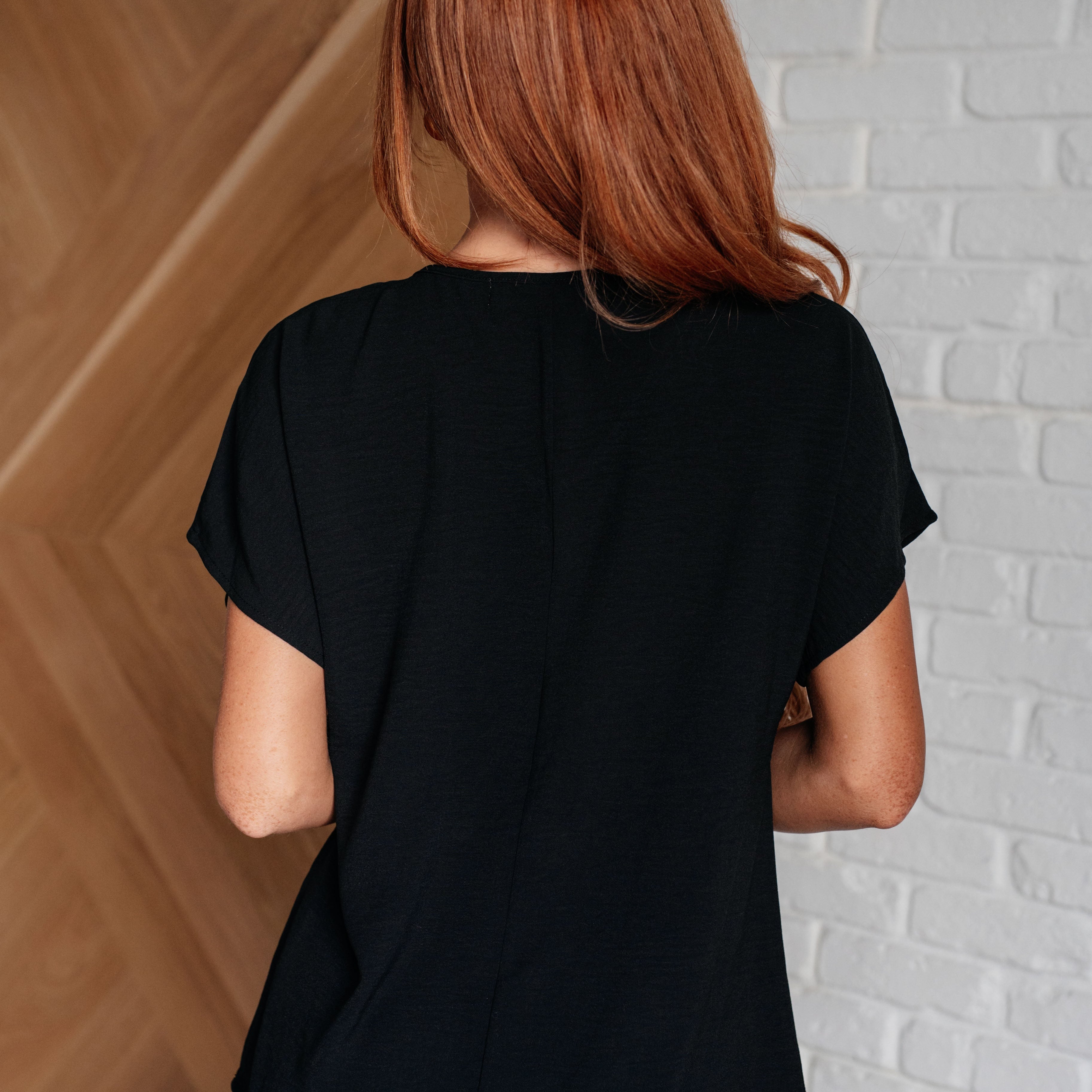 Frequently Asked Questions V-Neck Top in Black Tops Ave Shops- Tilden Co.