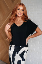 Frequently Asked Questions V-Neck Top in Black Tops Ave Shops- Tilden Co.