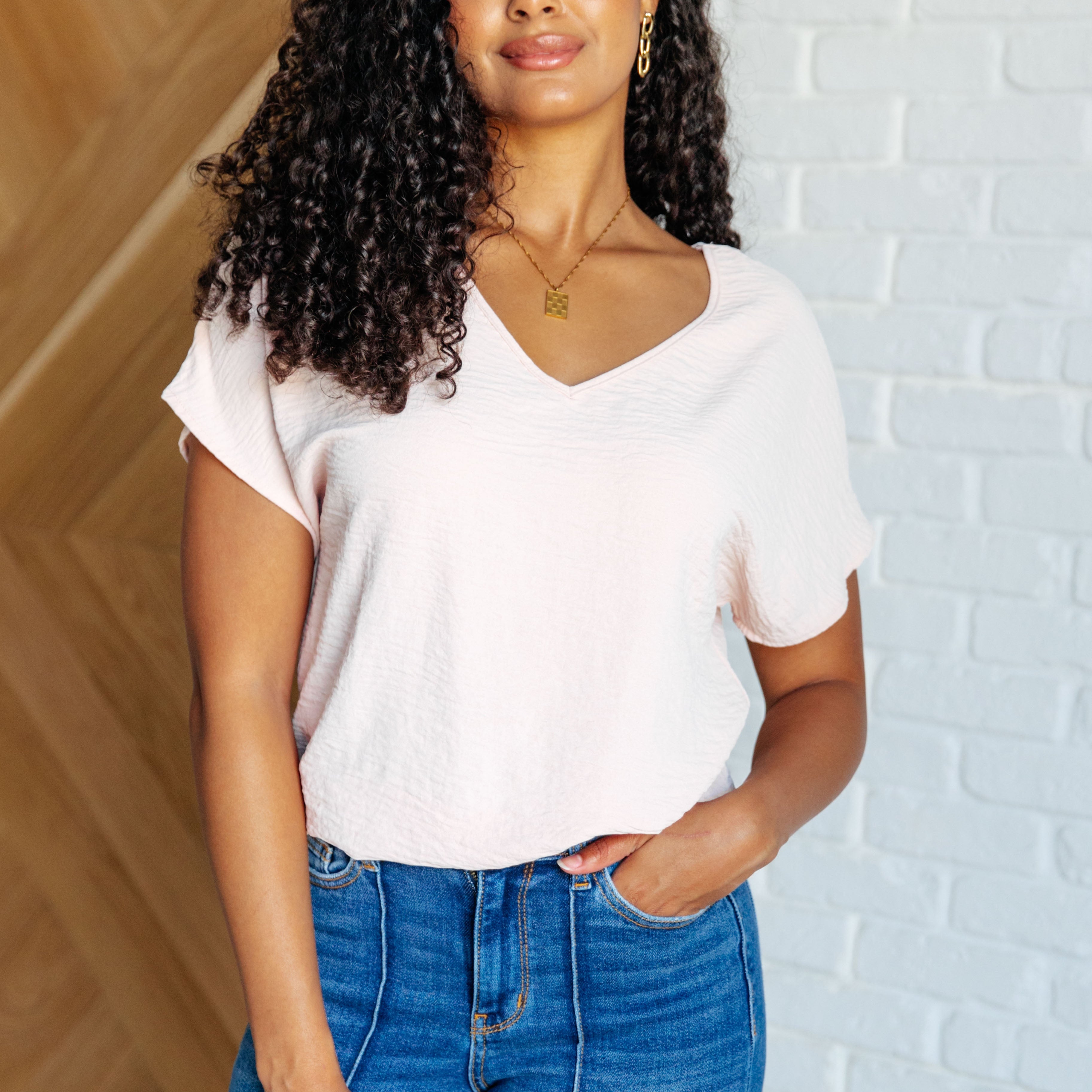 Frequently Asked Questions V-Neck Top in Blush Tops Ave Shops- Tilden Co.