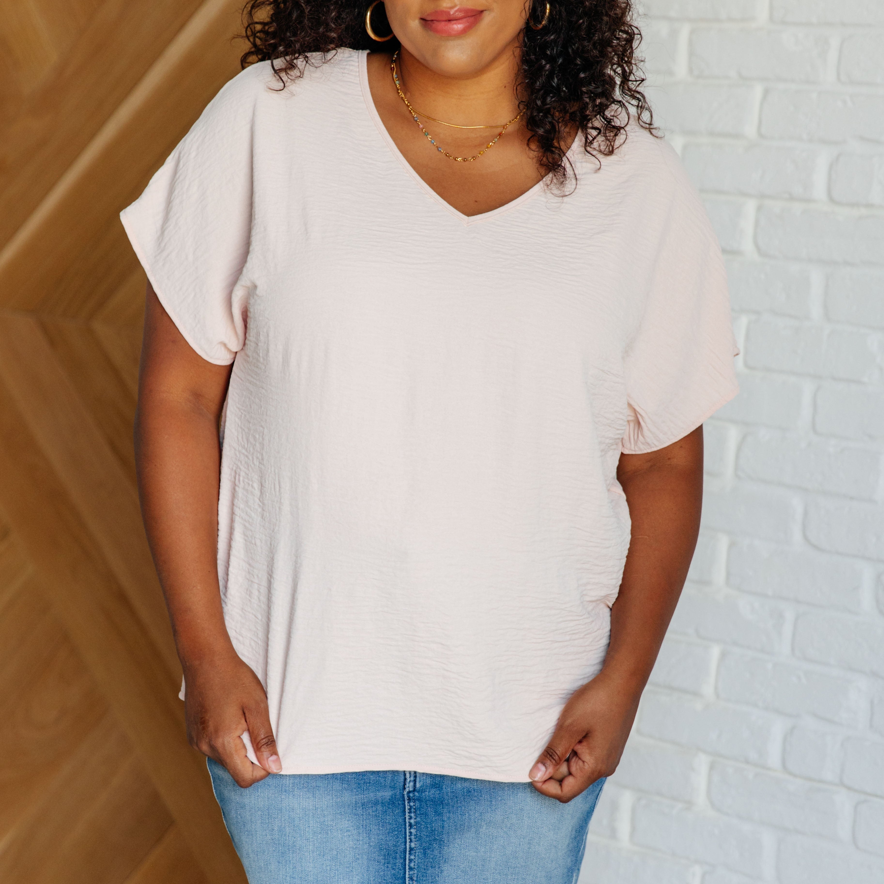 Frequently Asked Questions V-Neck Top in Blush Tops Ave Shops- Tilden Co.