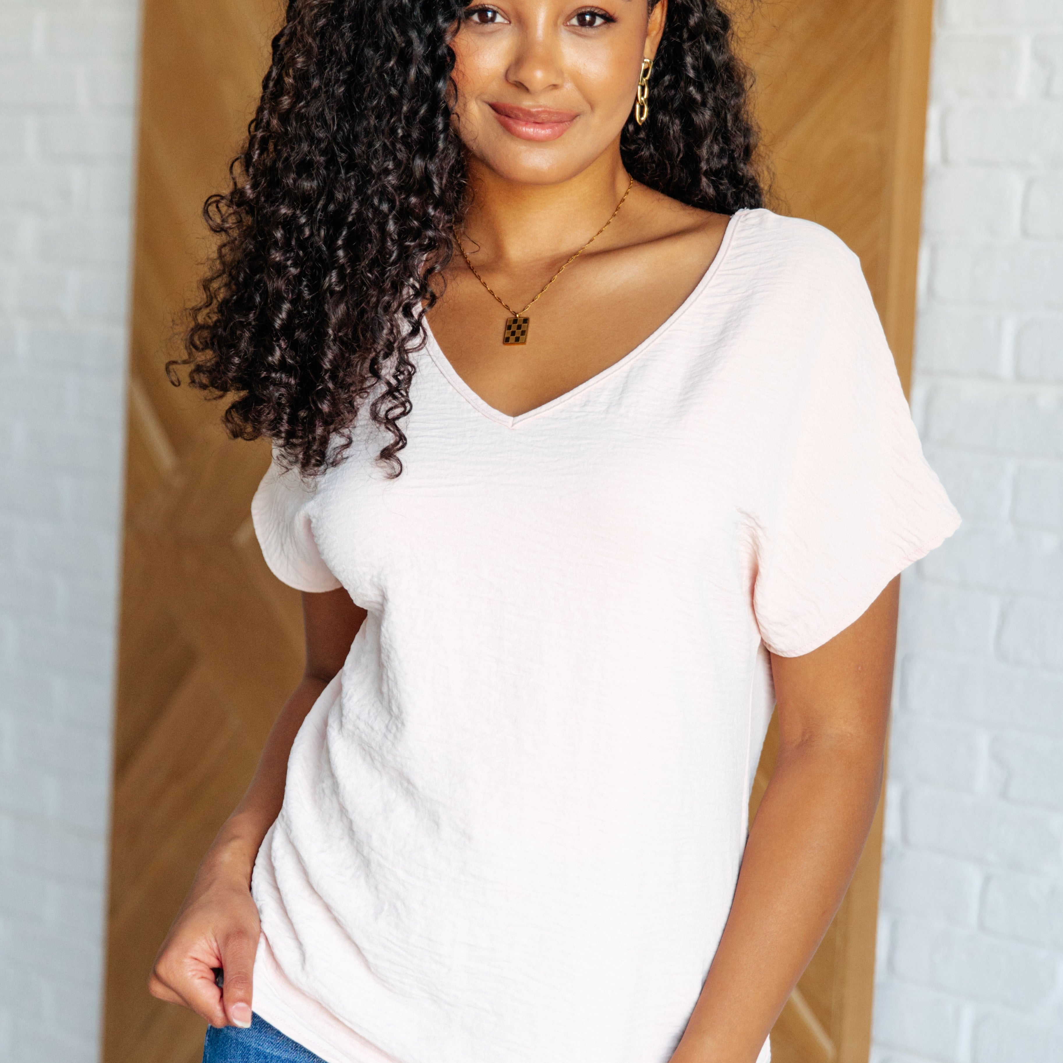 Frequently Asked Questions V-Neck Top in Blush Tops Ave Shops- Tilden Co.