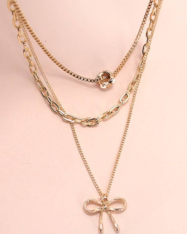 Pearl Bow Charm Necklace | 80N605 necklace JOSSLYN by wall to wall- Tilden Co.