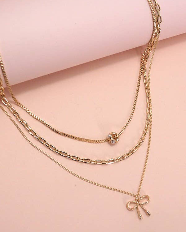 Pearl Bow Charm Necklace | 80N605 necklace JOSSLYN by wall to wall- Tilden Co.