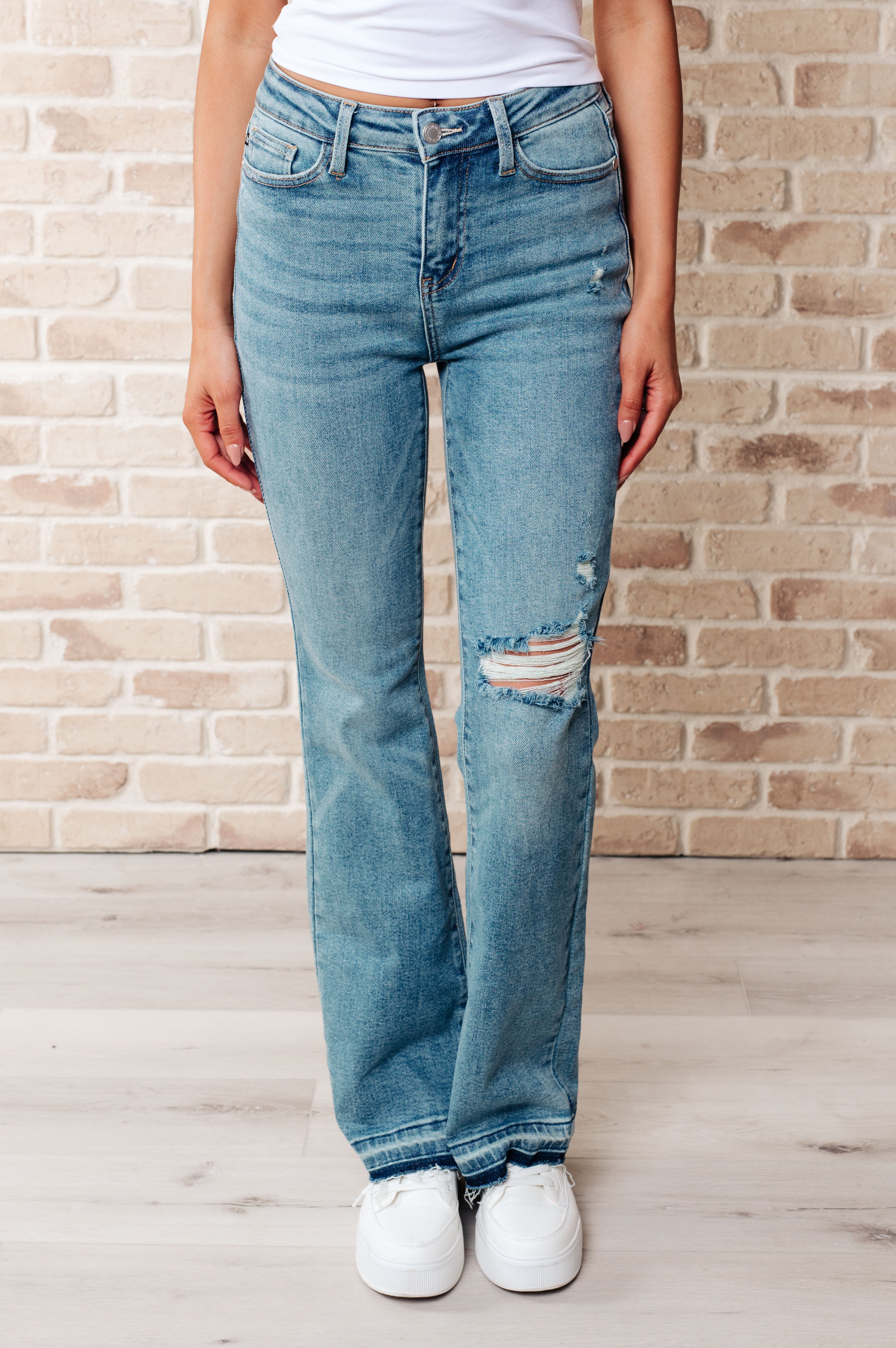 Isla Mid Rise Distressed Released Hem Bootcut Jeans    Womens Ave Shops- Tilden Co.