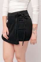 Bentli High Rise Side Tie Denim Skort in Black    Denim Ave Shops- Tilden Co.