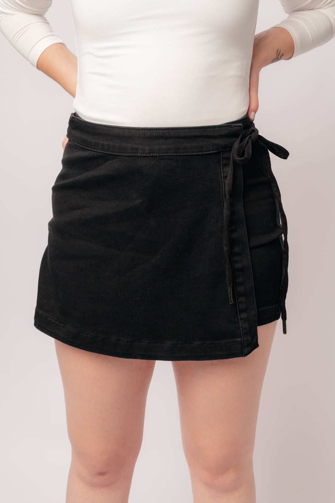 Bentli High Rise Side Tie Denim Skort in Black    Denim Ave Shops- Tilden Co.