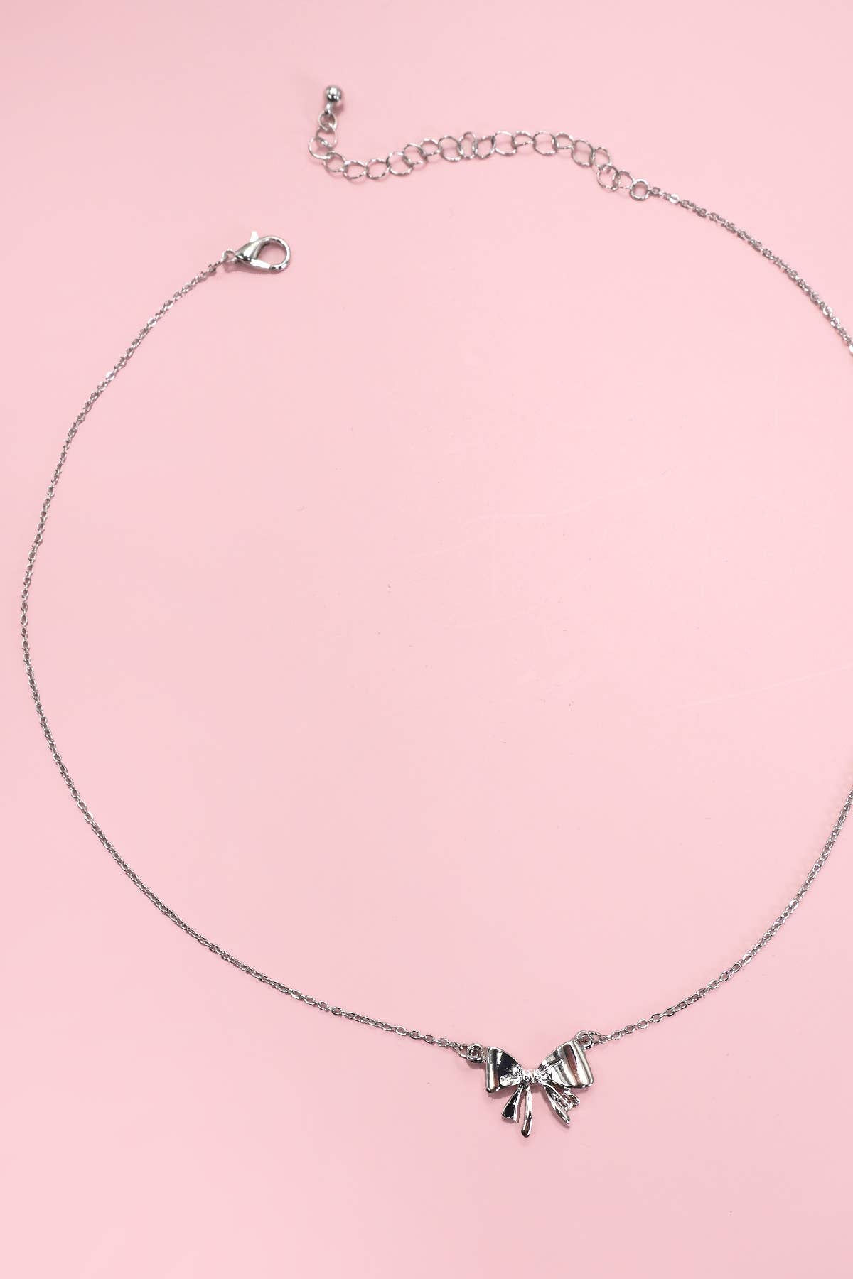 MINI BOW RIBBON NECKLACE | 80N427 Silver Silver necklace JOSSLYN by wall to wall- Tilden Co.