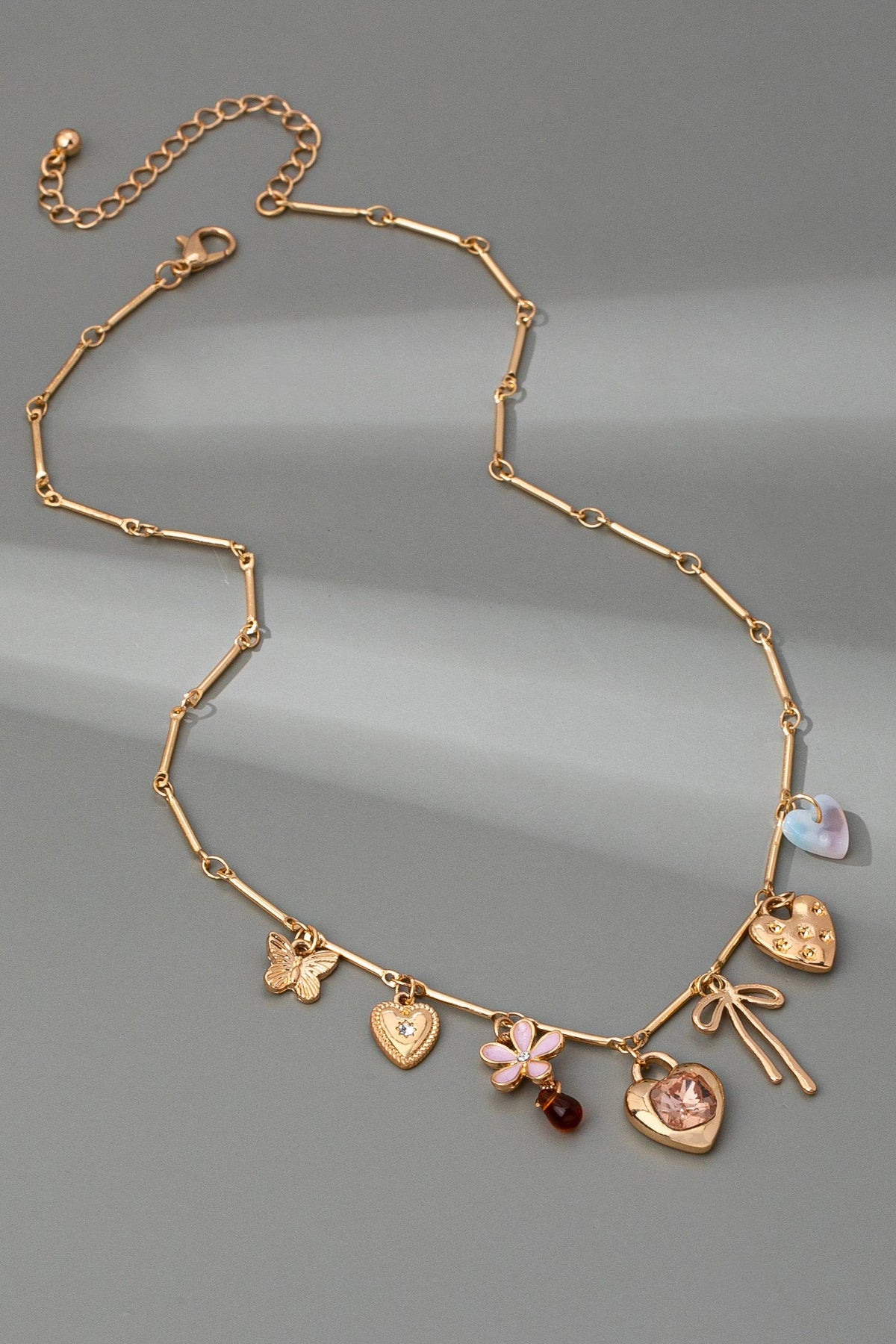 CHARM NECKLACE-HEARTS FLOWER BOW BUTTERFLY | 80N92639 JOSSLYN by wall to wall- Tilden Co.