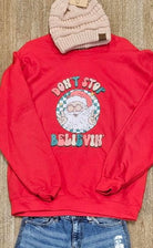 Don’t Stop Believing Crewneck Sweatshirt in Red     Daydreamer Creations- Tilden Co.