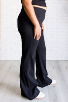 Building Habits Twill Flared Crossover Waist Pant in Black    Bottoms Ave Shops- Tilden Co.