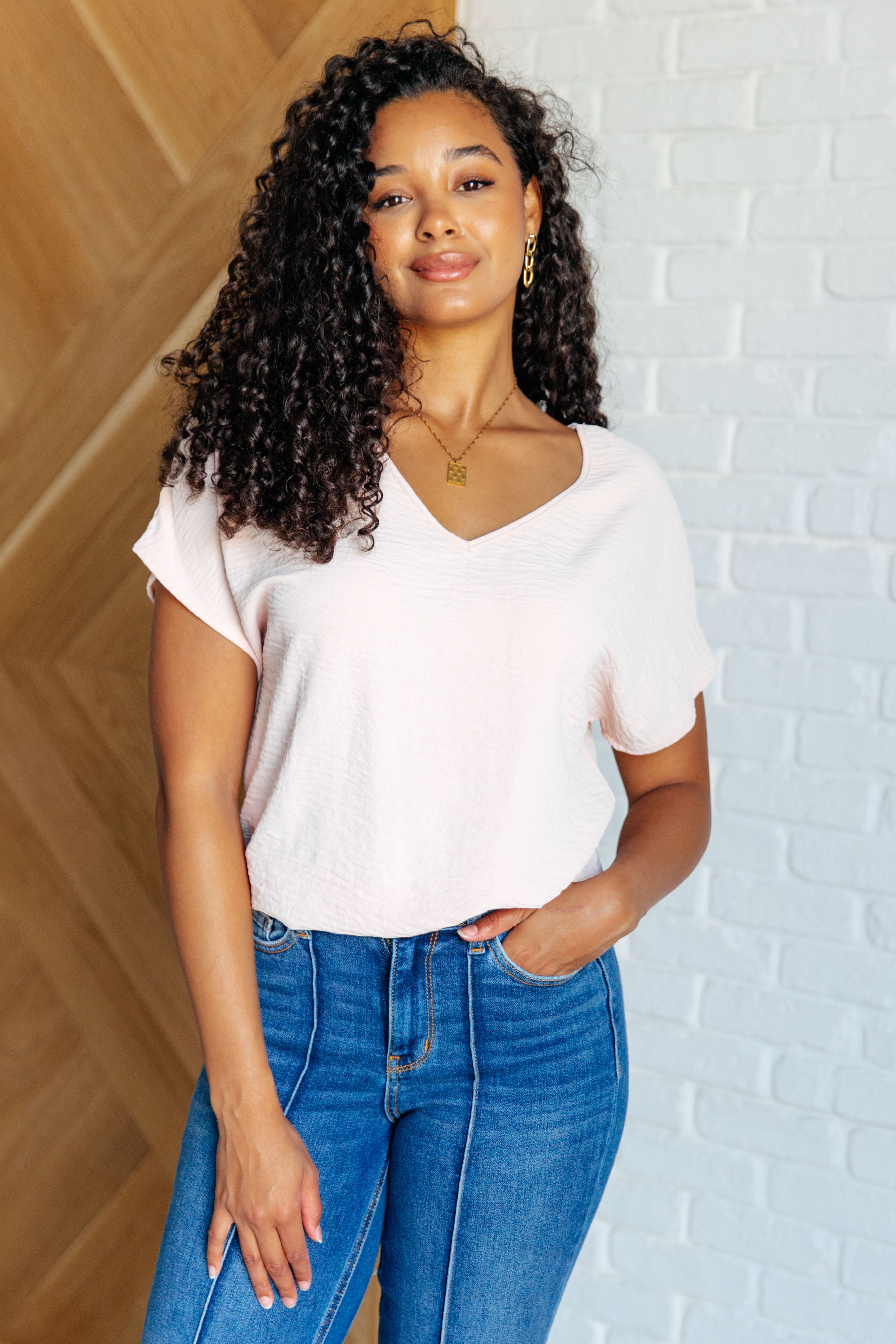 Frequently Asked Questions V-Neck Top in Blush Tops Ave Shops- Tilden Co.