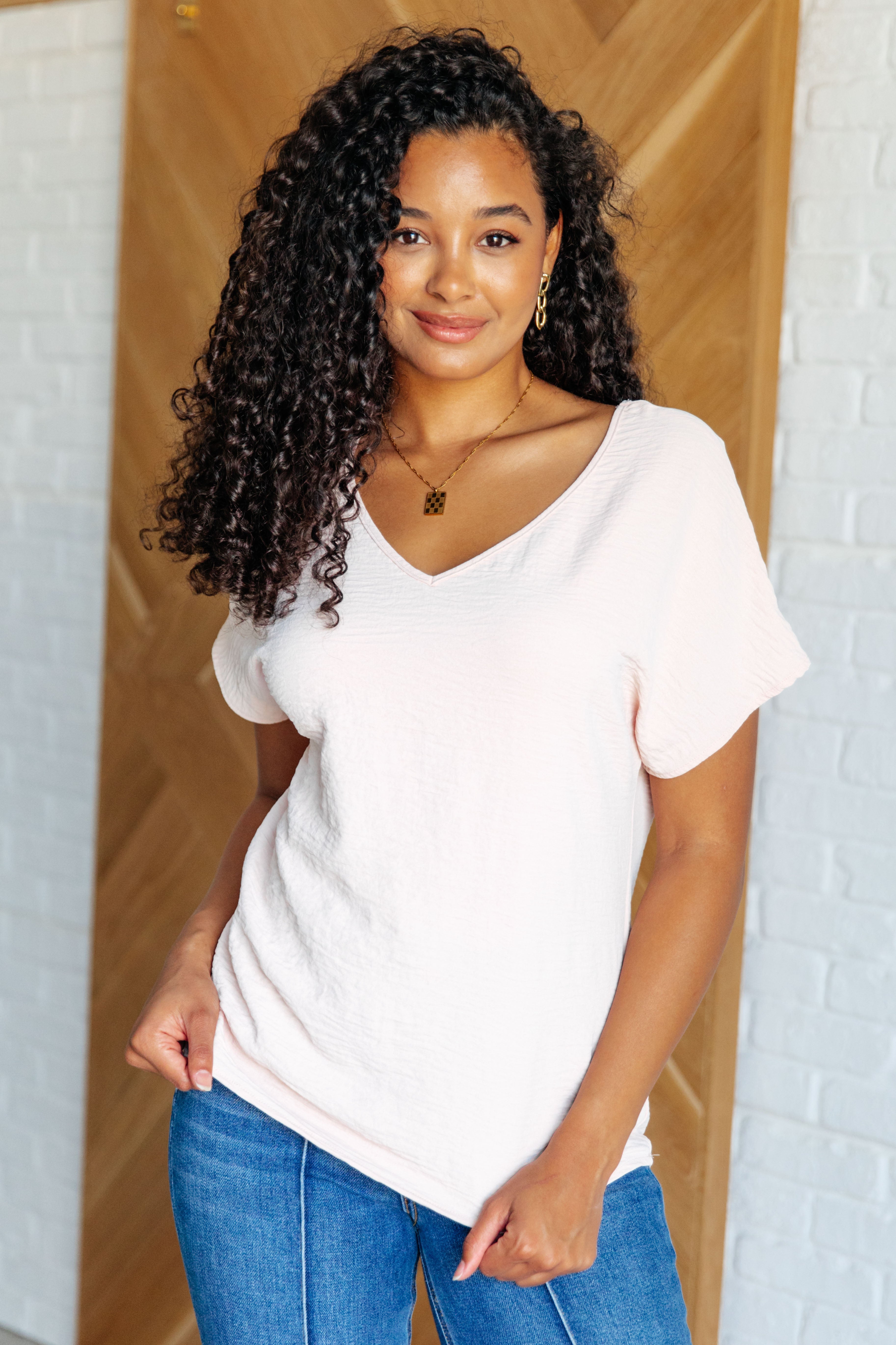 Frequently Asked Questions V-Neck Top in Blush Tops Ave Shops- Tilden Co.