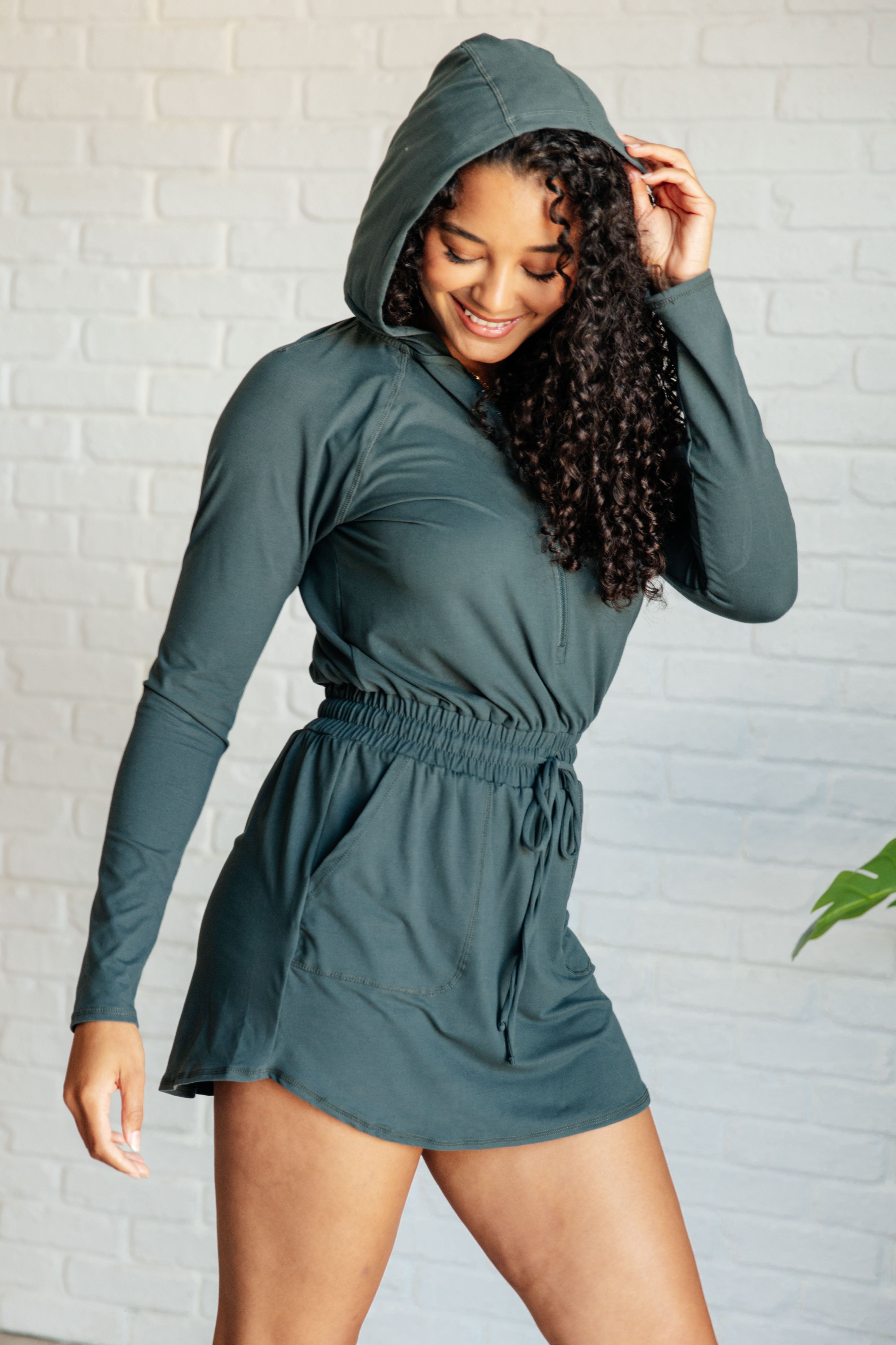 Getting Out Long Sleeve Hoodie Romper in Smoked Spruce    Jumpsuits & Rompers Ave Shops- Tilden Co.