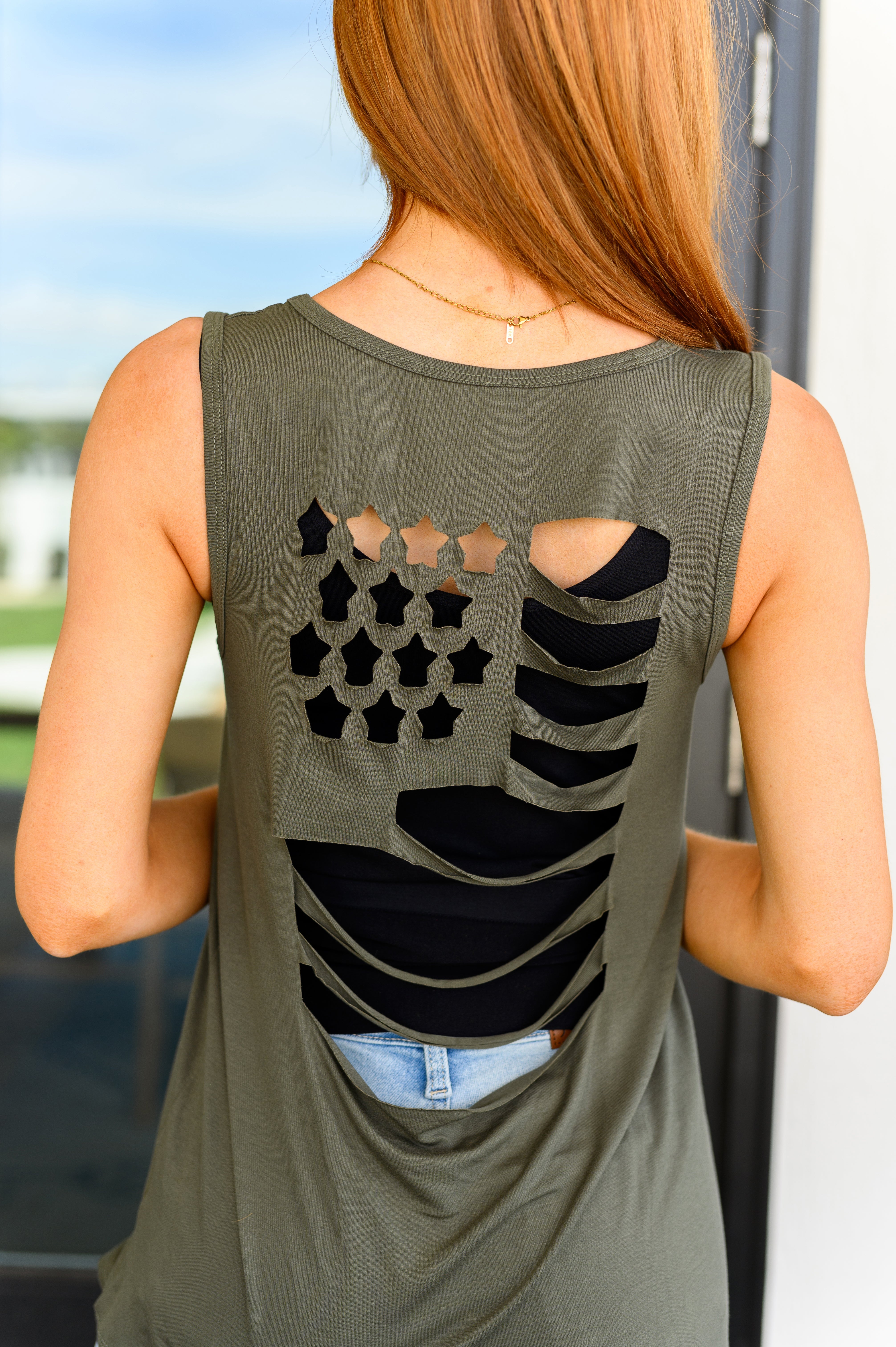 Land of the Free Tank in Olive Tops Ave Shops- Tilden Co.