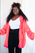 Noticed in Neon Checkered Cardigan in Pink and Orange    Layers Ave Shops- Tilden Co.