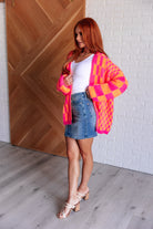 Noticed in Neon Checkered Cardigan in Pink and Orange    Layers Ave Shops- Tilden Co.