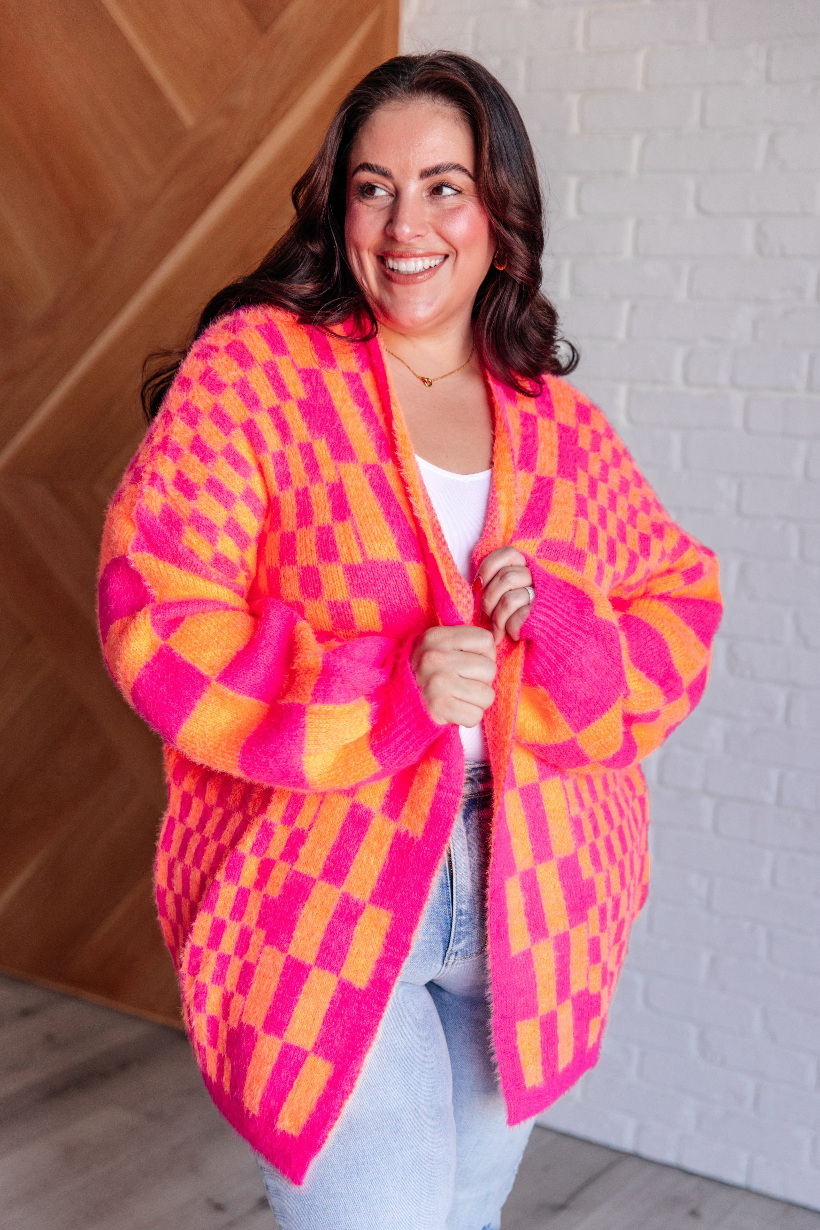 Noticed in Neon Checkered Cardigan in Pink and Orange    Layers Ave Shops- Tilden Co.