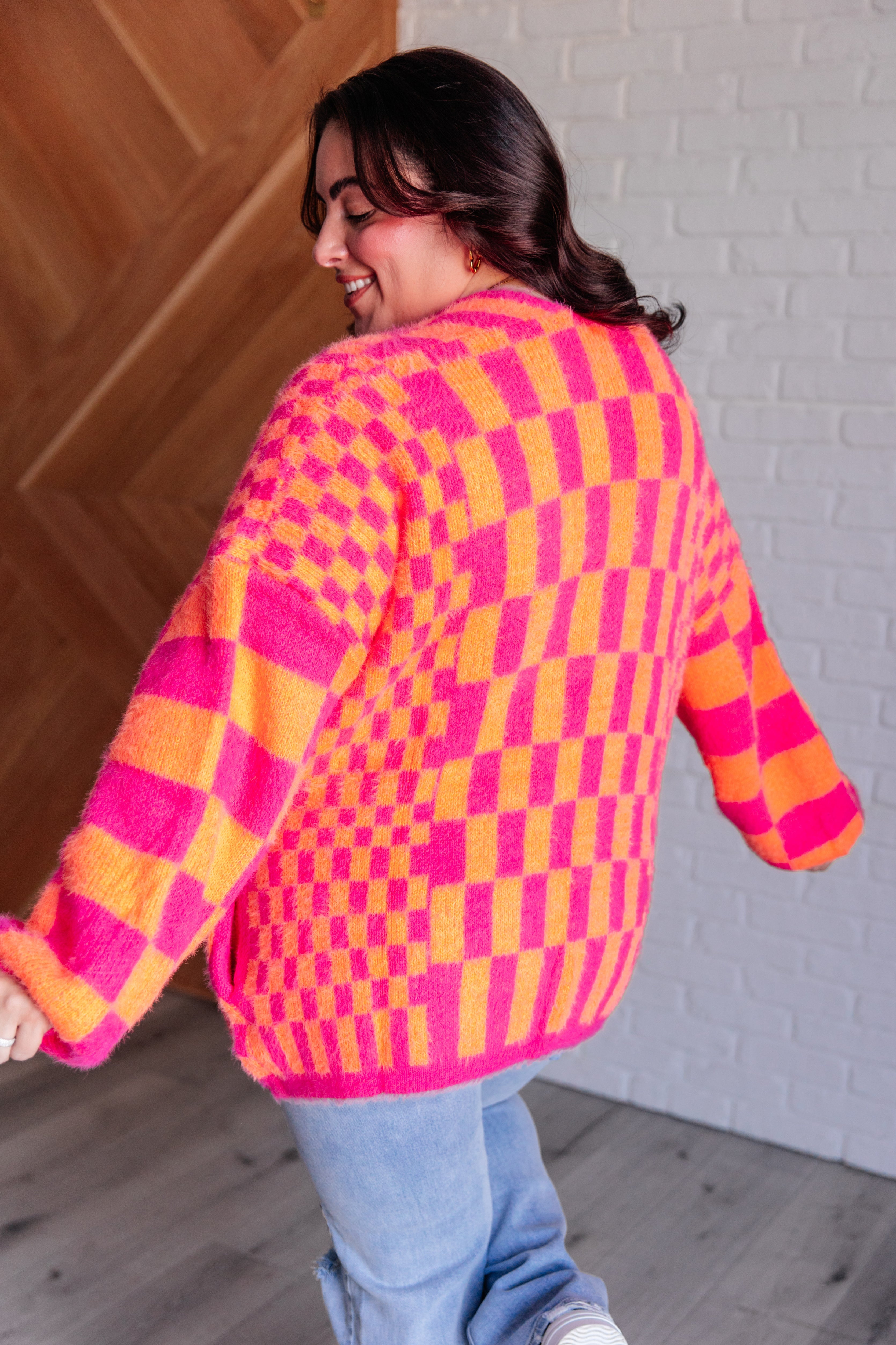 Noticed in Neon Checkered Cardigan in Pink and Orange    Layers Ave Shops- Tilden Co.