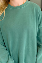 Talk Cozy to Me Stepped Hem Pullover in Dark Green Womens Ave Shops- Tilden Co.