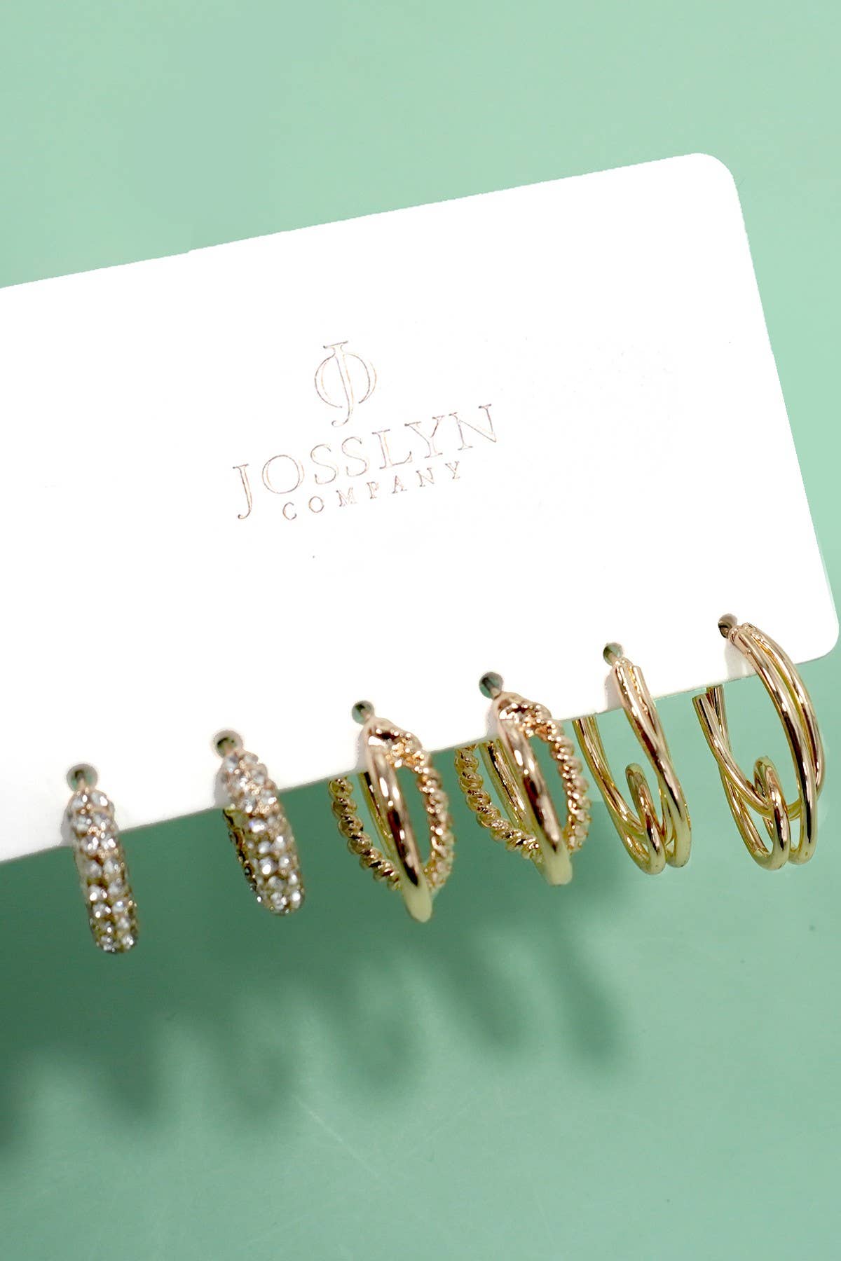 TRIO HUGGIE HOOP RHINESTONE TITANIUM POST EARRINGS | 80E5807 GOLD GOLD JOSSLYN by wall to wall- Tilden Co.