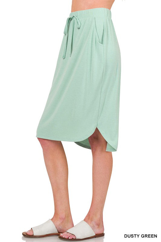 Tulip Hem Skirt With Side Pockets - Dusty Green    Skirt Zenana- Tilden Co.